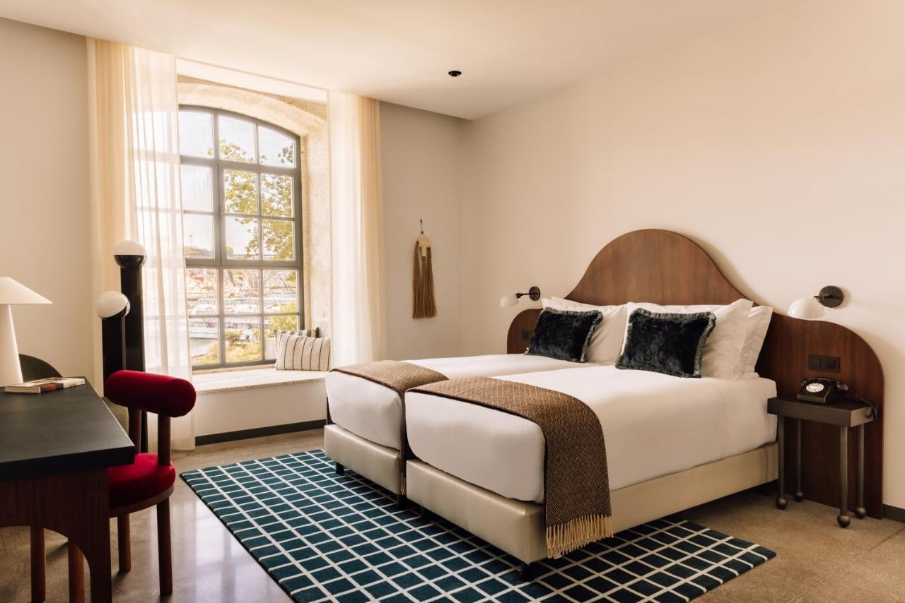 The Rebello Hotel & Spa - Small Luxury Hotels Of The World บีลาโนวาเดกายา ภายนอก รูปภาพ A guest room at the Hotel 57